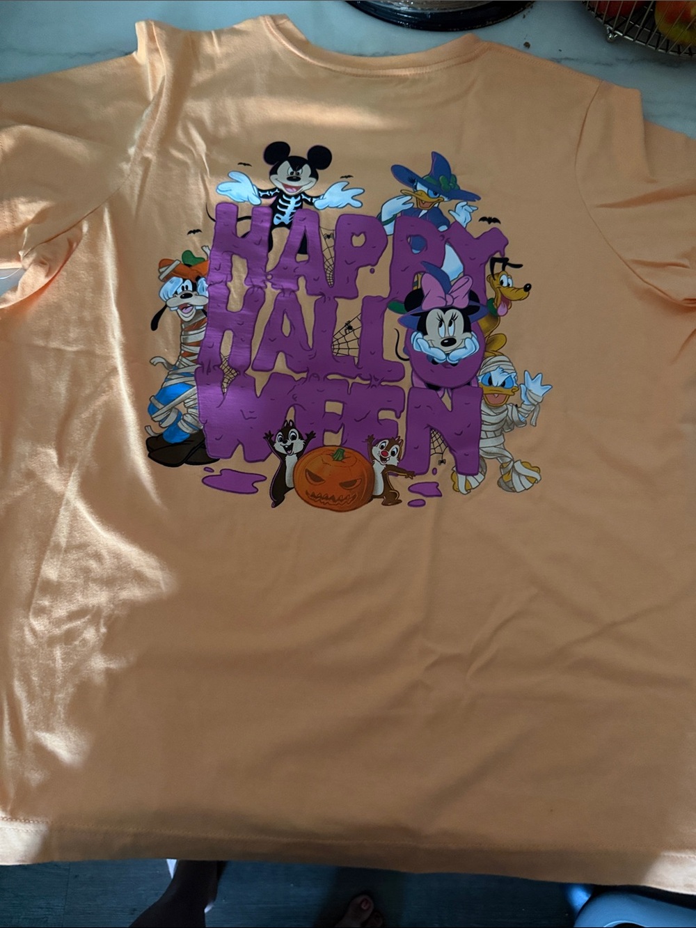 Disney Peach Tee with Purple Halloween Graphic